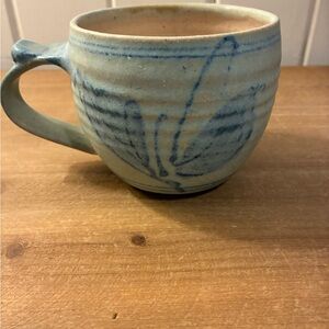 Handcrafted Ceramic Mug in Light Blue with Blue Leaf Design